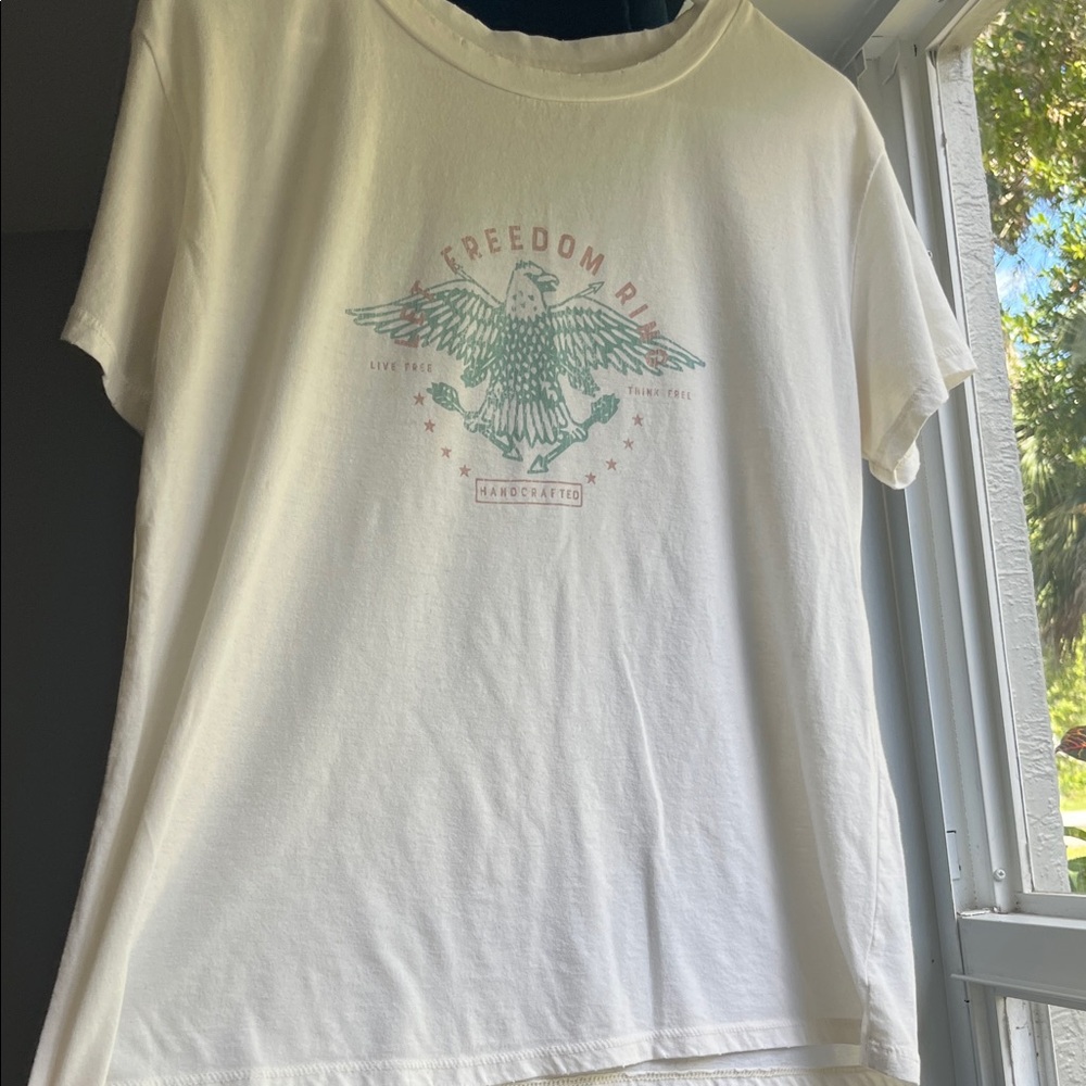 “Let Freedom Ring” Cream Graphic Tee with Teal and Mauve Logo